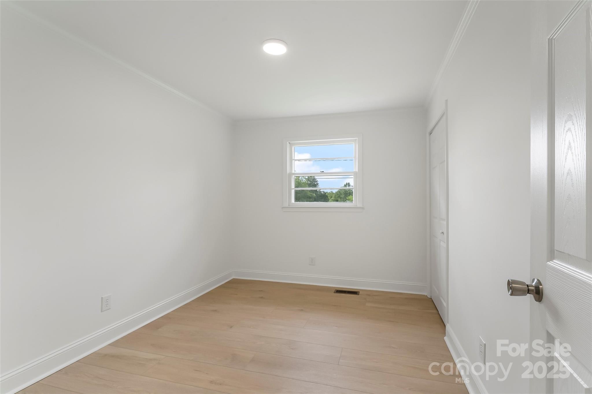 4146 Old State Road Newton, NC 28658 - Photo 8 of 26 an empty room with a window