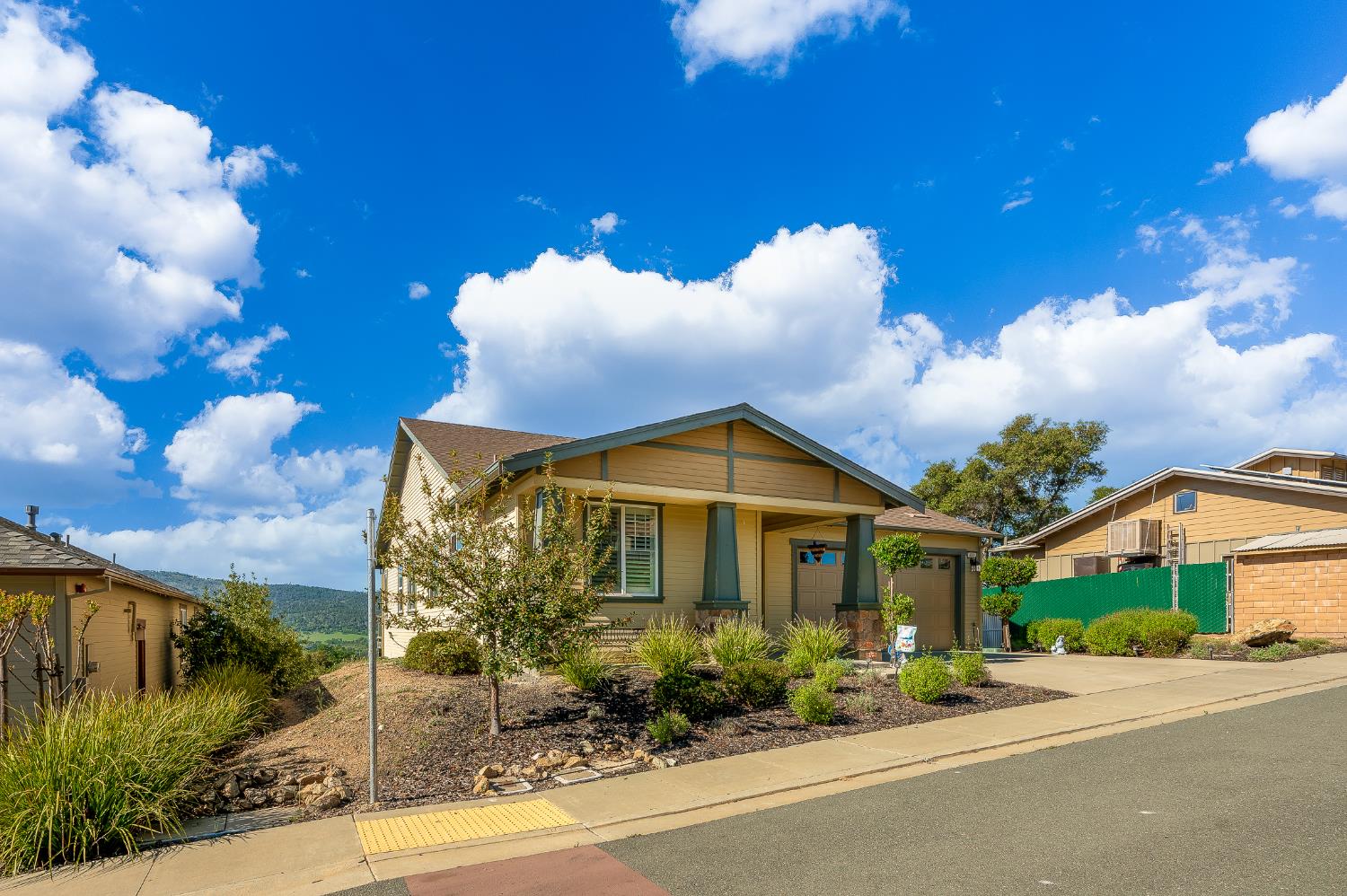 401 McCauley Ranch Road Angels Camp, CA 95222 - Photo 56 of 57 a front view of a house with garden