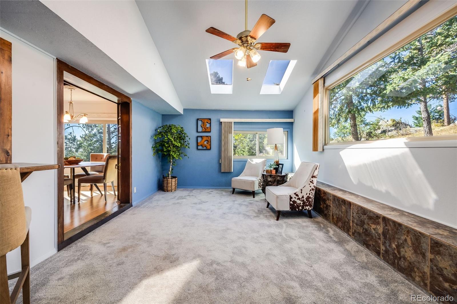 8644 Doubleheader Ranch Road Morrison, CO 80465 - Photo 6 of 36 a very nice looking room with a large window