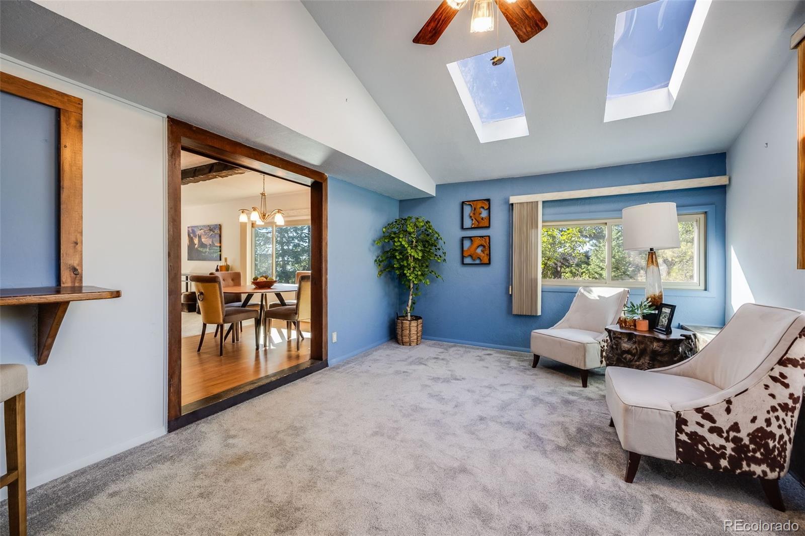 8644 Doubleheader Ranch Road Morrison, CO 80465 - Photo 7 of 36 a bed room with furniture and a window