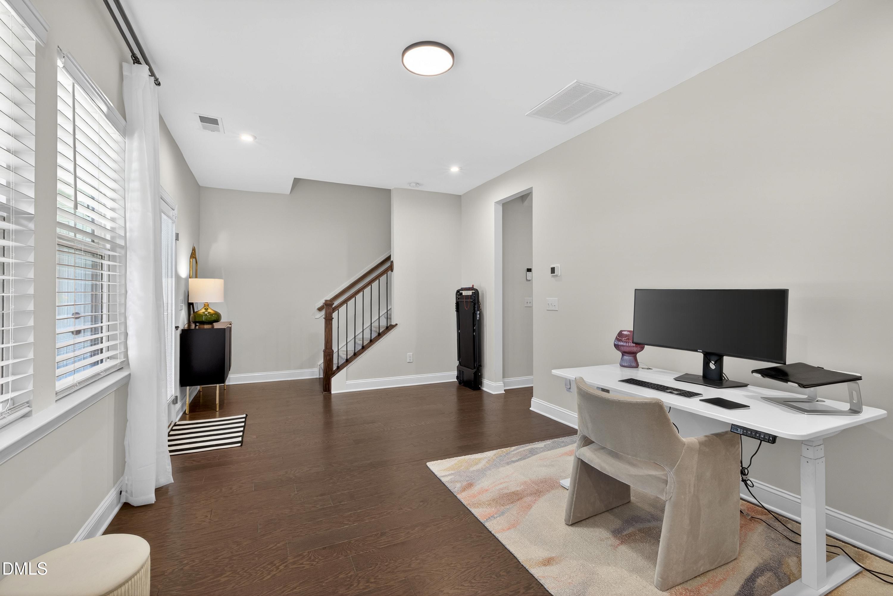 1063 Danvers Loop Apex, NC 27523 - Photo 56 of 67 a workspace with furniture and stairs