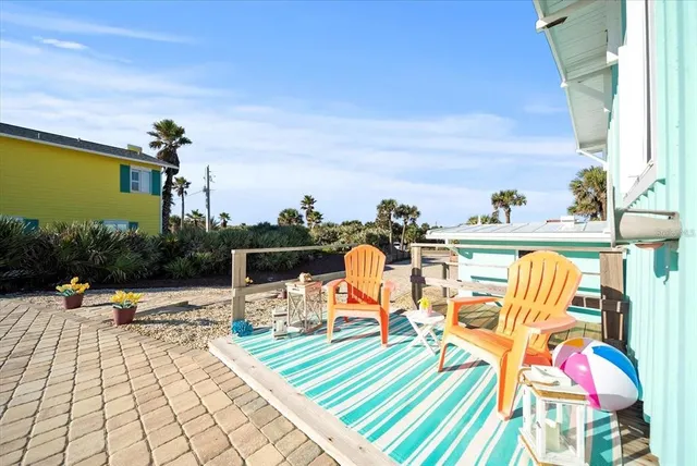 a view of entryway with hall and wooden floor
