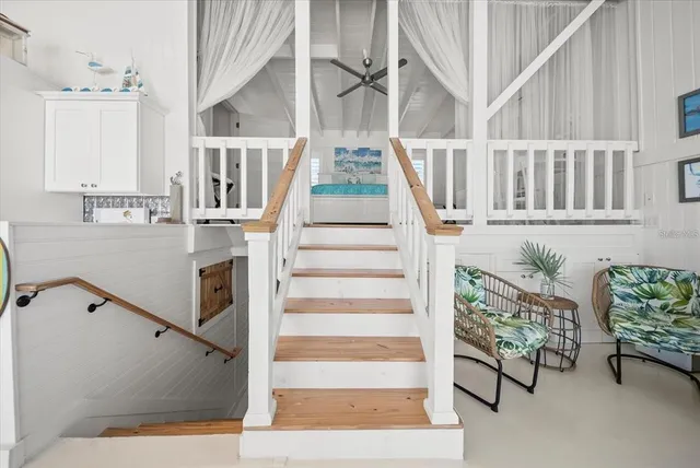 a bedroom with a bed and a table in it