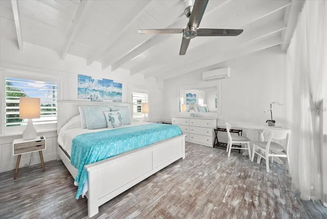a view of wooden floor and a window