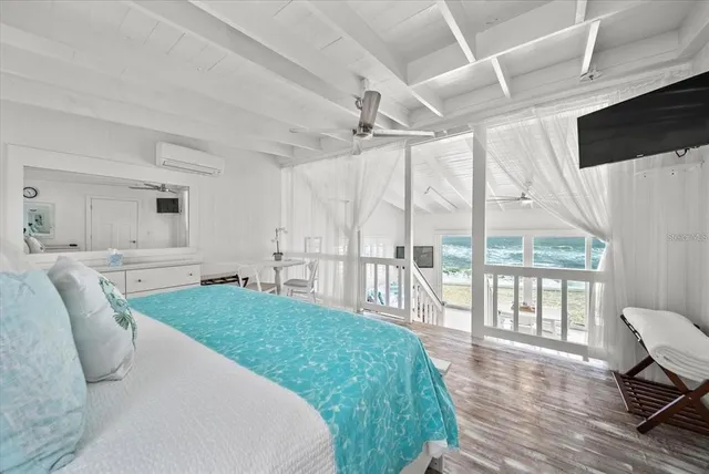 a spacious bathroom with a double vanity sink a mirror and a bathtub