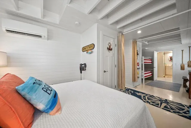 a bathroom with a sink a toilet and a shower