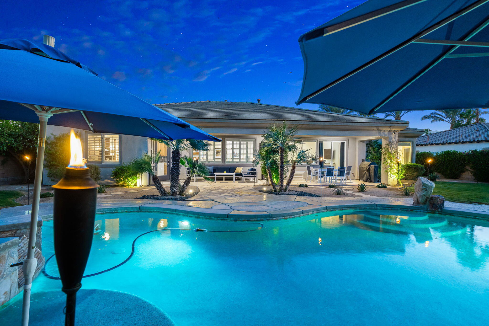 80676 Plum Lane Indio, CA 92201 - Photo 18 of 26 a view of swimming pool with outdoor seating