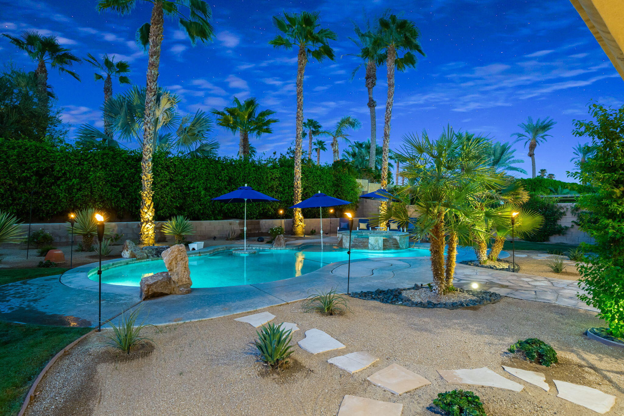 80676 Plum Lane Indio, CA 92201 - Photo 19 of 26 a view of a park with potted plants and palm trees