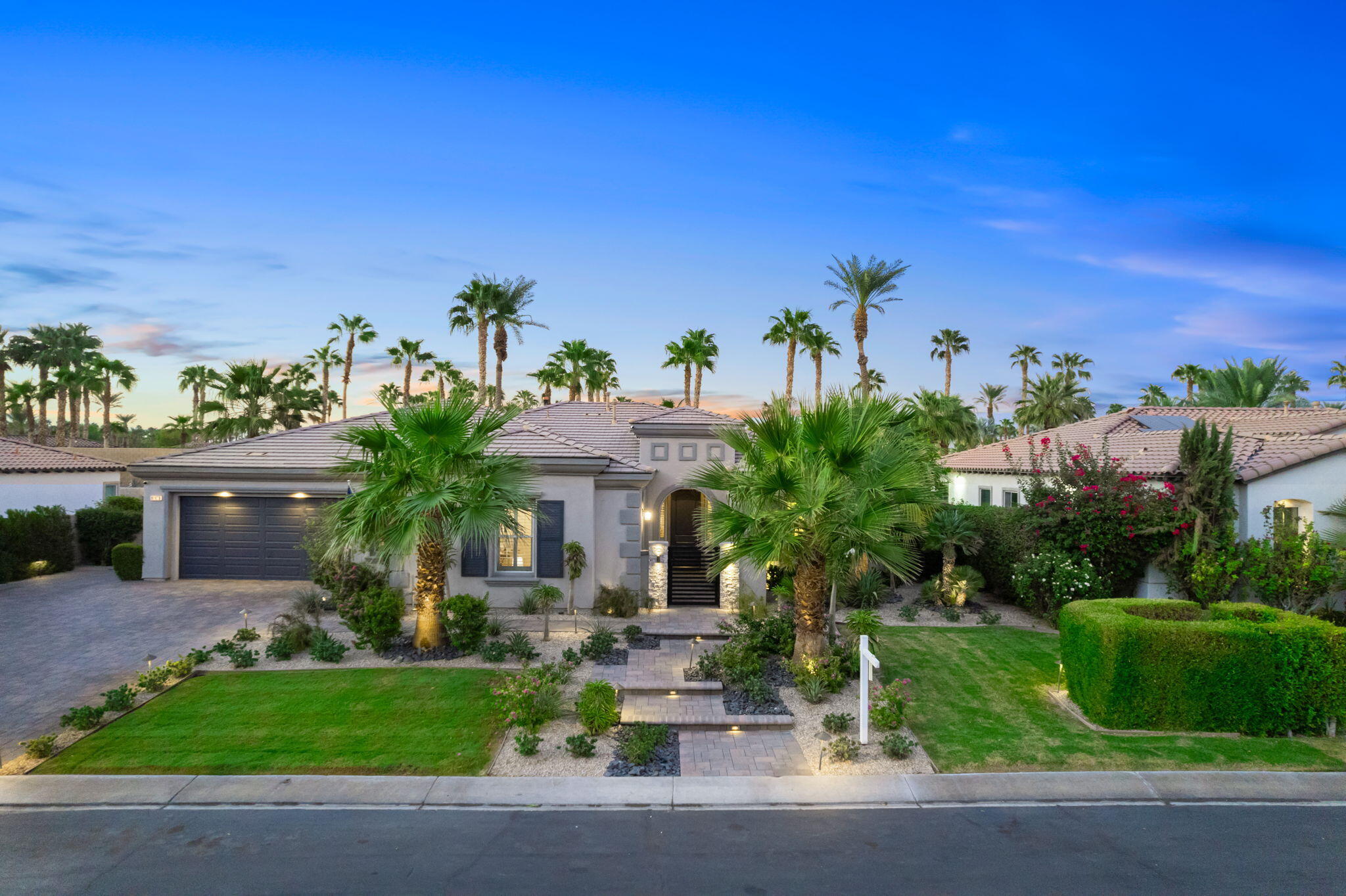 80676 Plum Lane Indio, CA 92201 - Photo 2 of 26 a front view of a house with a yard