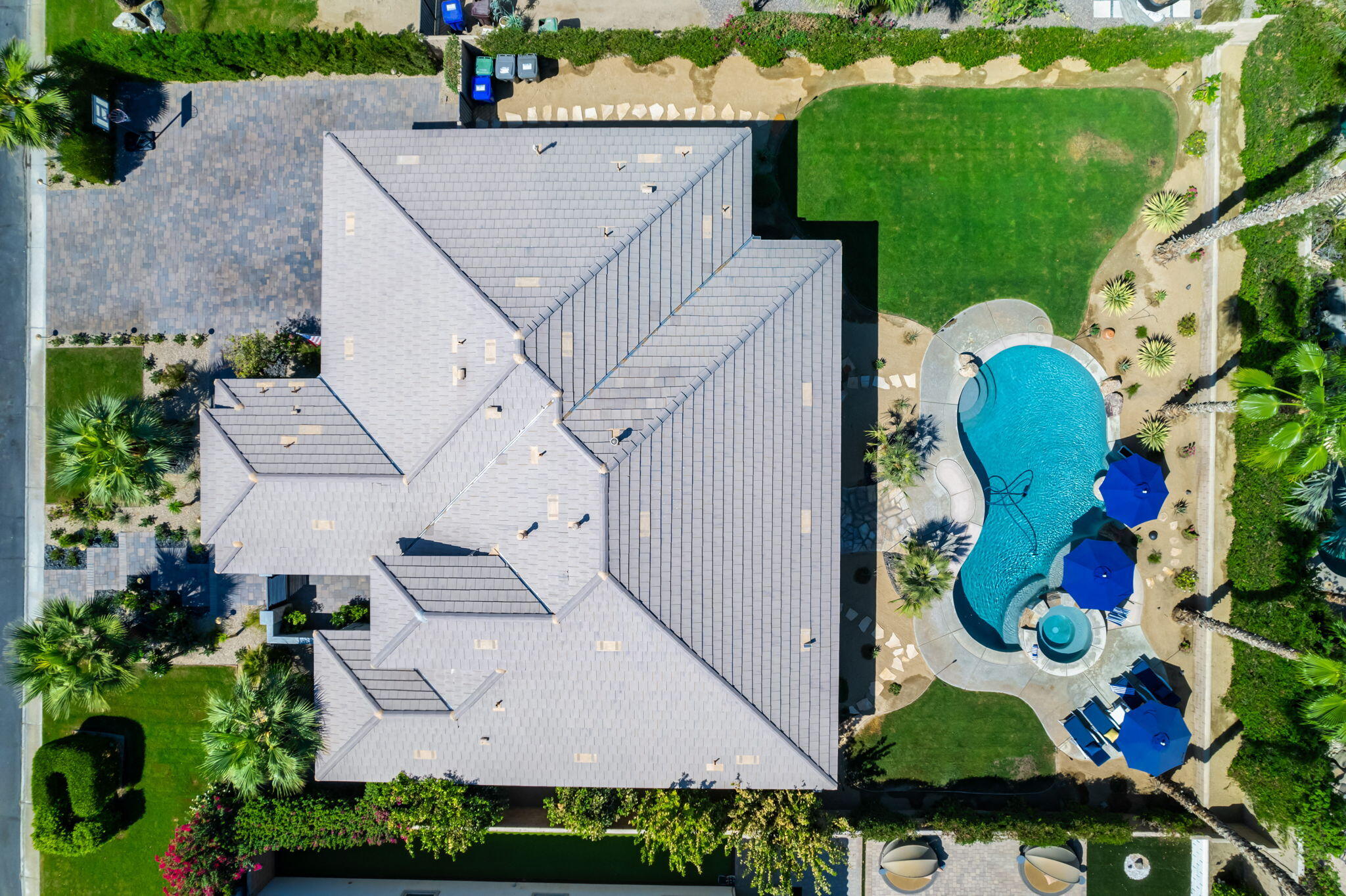 80676 Plum Lane Indio, CA 92201 - Photo 23 of 26 an aerial view of a house with a garden and trees
