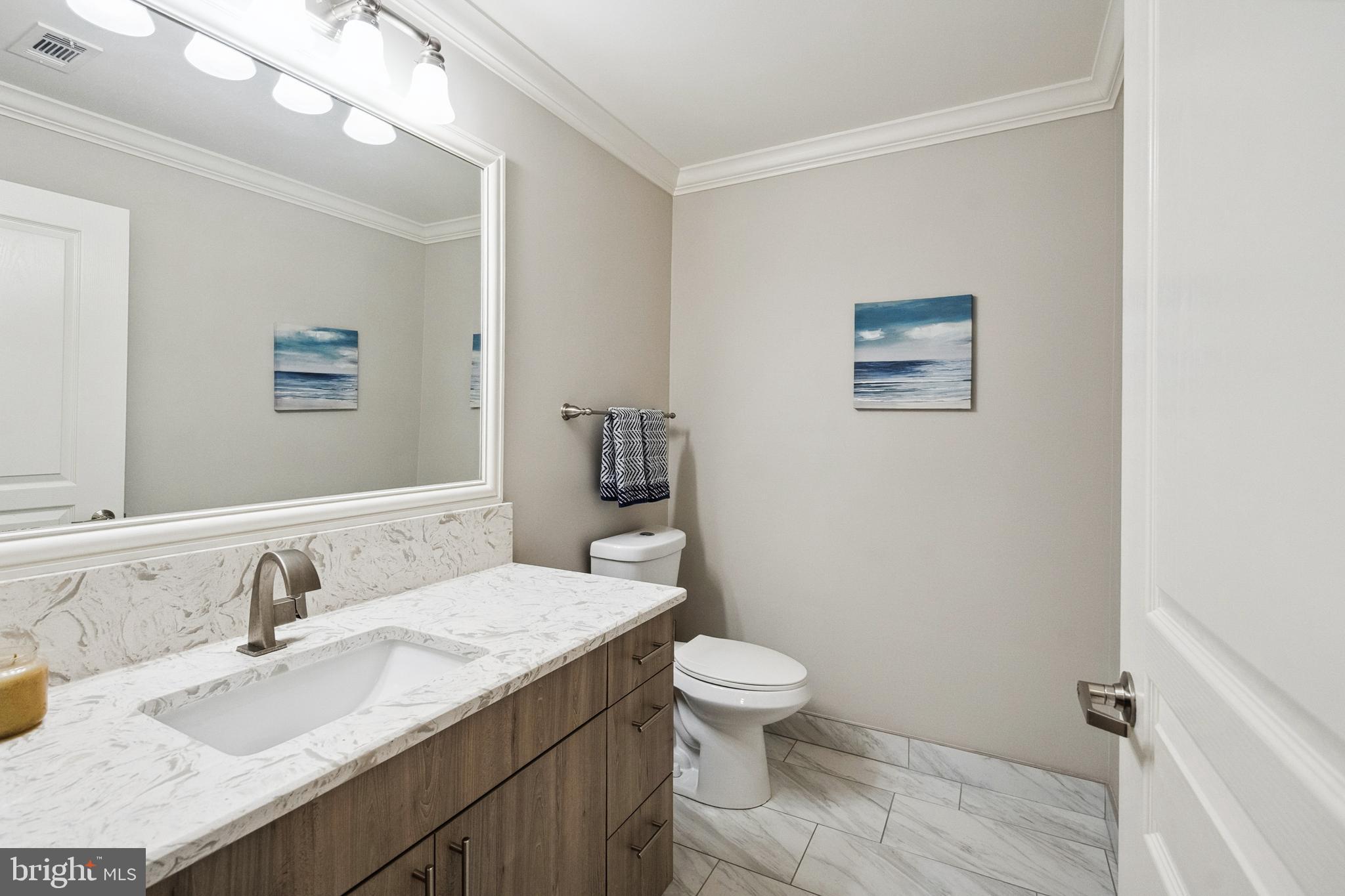 12001 Market Street, Unit 441 Reston, VA 20190 - Photo 27 of 42 Totally Renovated Main Level Powder Room