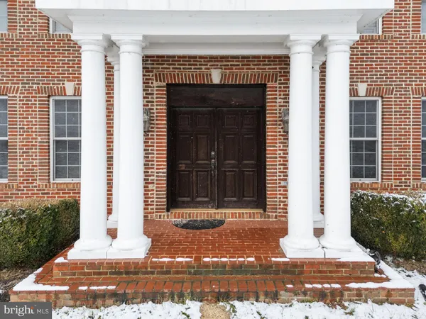a kitchen with stainless steel appliances granite countertop a stove refrigerator sink and cabinets