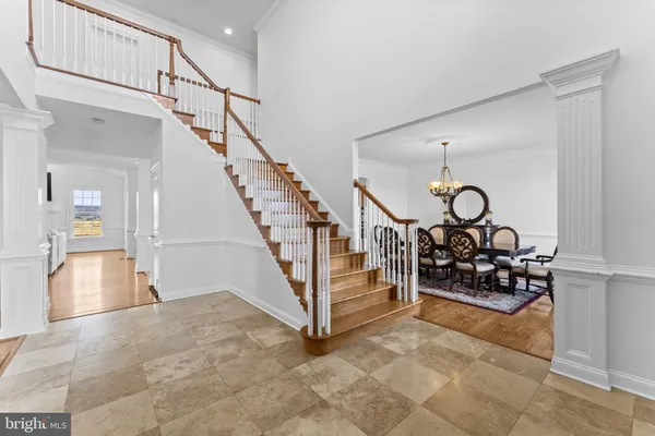 a kitchen with stainless steel appliances granite countertop a stove a sink dishwasher and cabinets