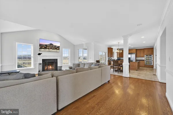 a room with a desk and wooden floor