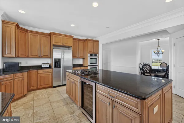 a room with gym equipment and windows