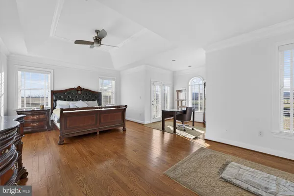a view of an empty room with glass door
