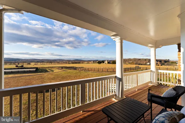 a kitchen with a sink stove top oven and cabinets