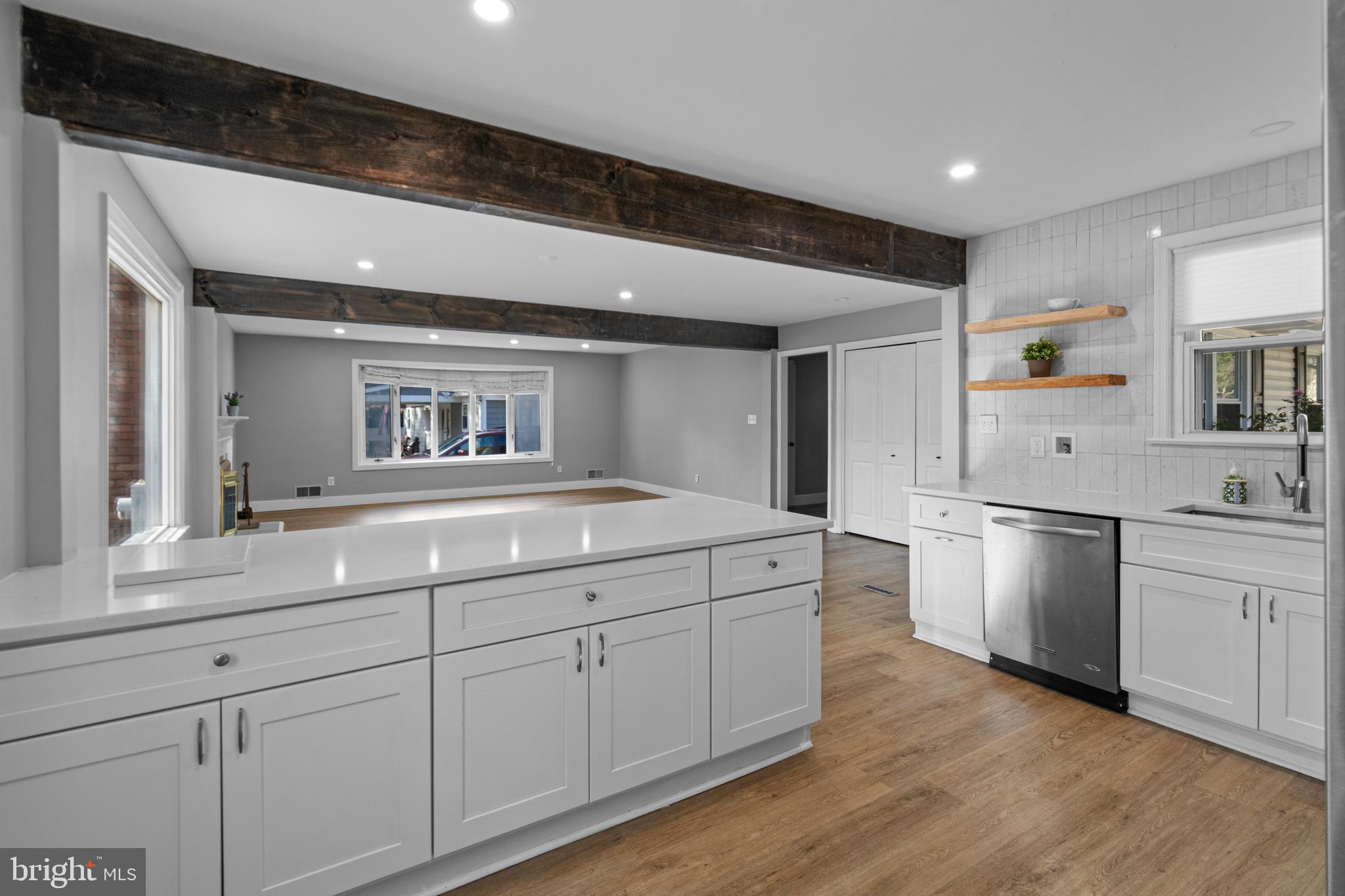 9 Robinson Road Severna Park, MD 21146 - Photo 15 of 51 a kitchen with white cabinets and sink