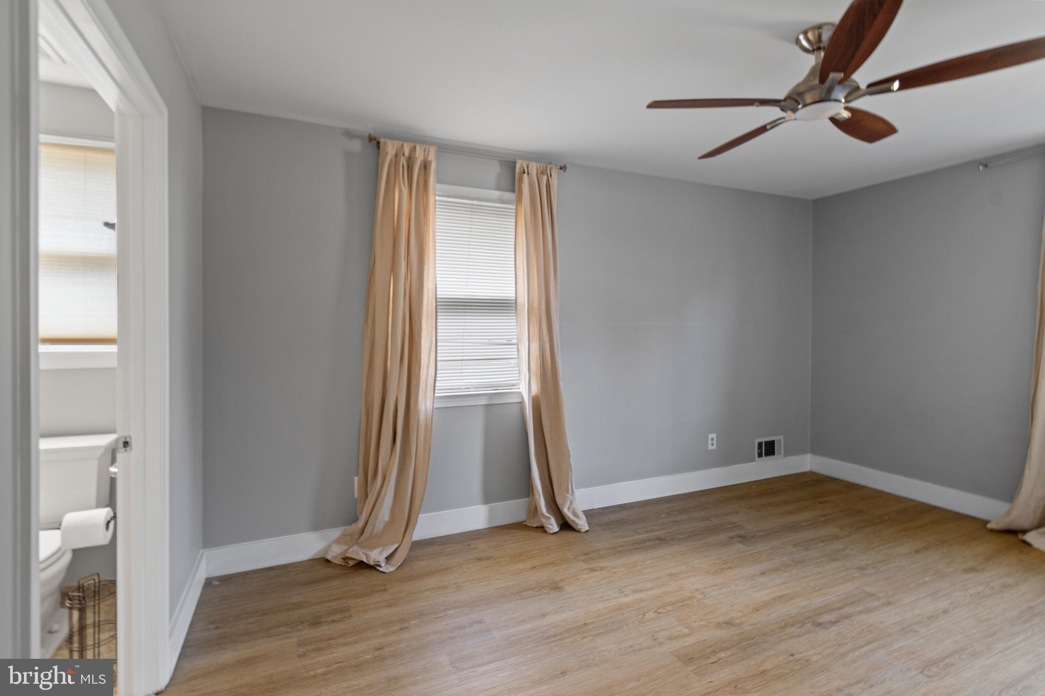 9 Robinson Road Severna Park, MD 21146 - Photo 19 of 51 a view of an empty room with a window