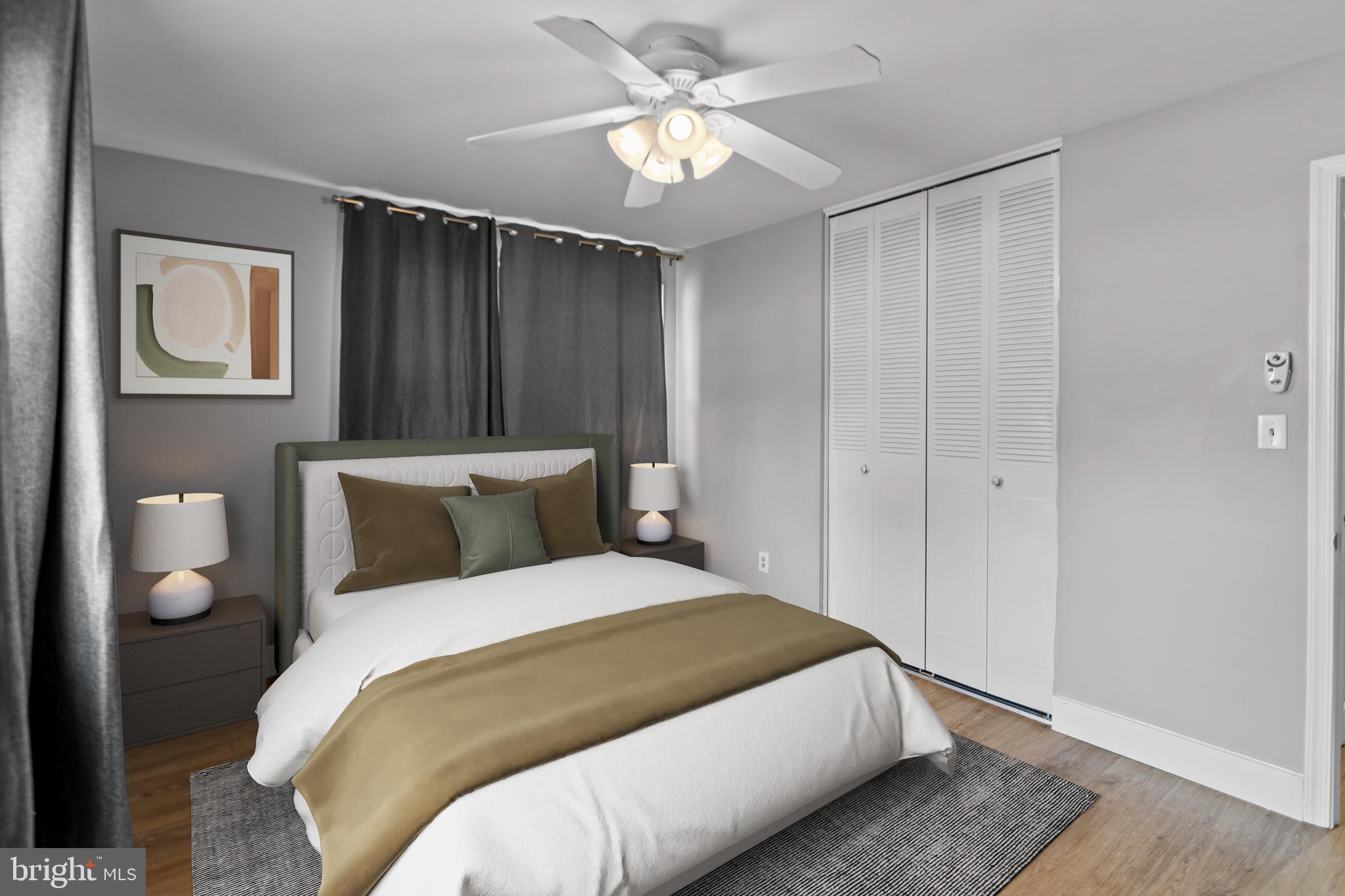 9 Robinson Road Severna Park, MD 21146 - Photo 27 of 51 a bedroom with a bed and a chandelier