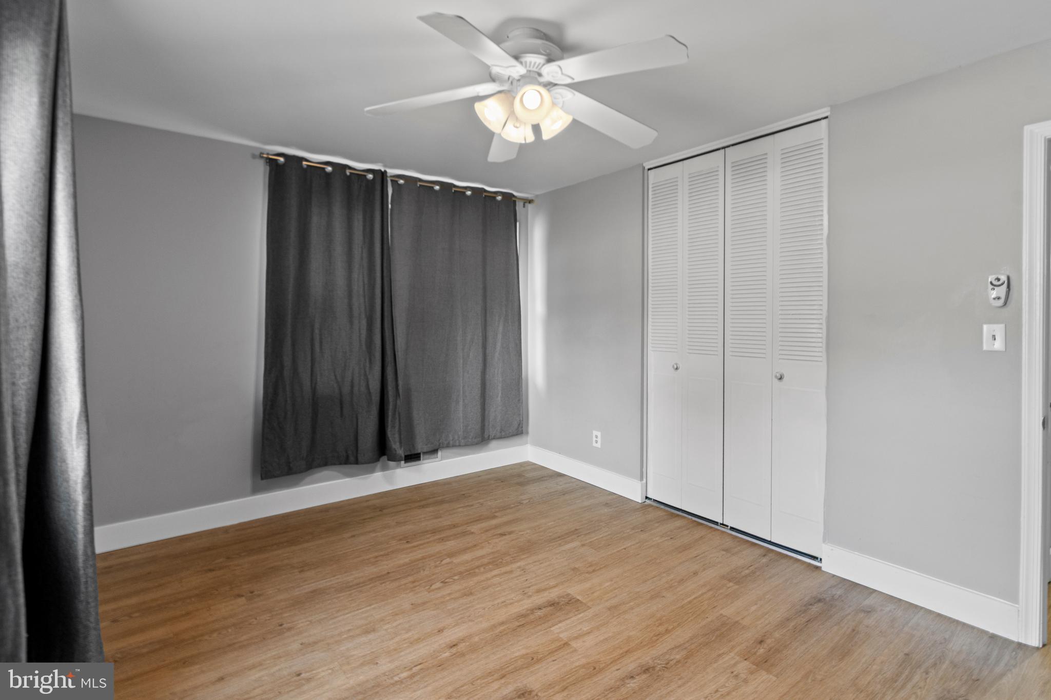 9 Robinson Road Severna Park, MD 21146 - Photo 28 of 51 a view of an empty room with wooden floor