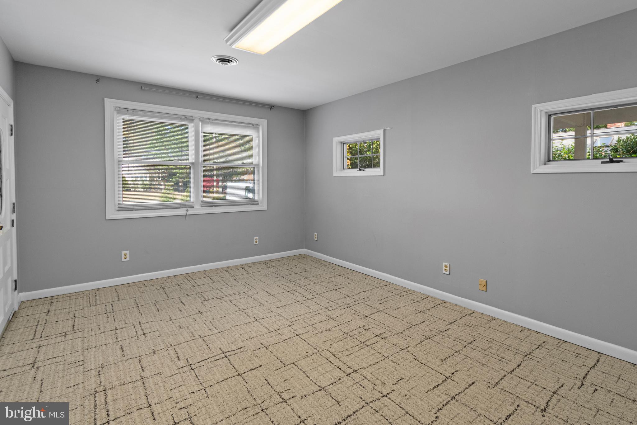 9 Robinson Road Severna Park, MD 21146 - Photo 31 of 51 an empty room with windows