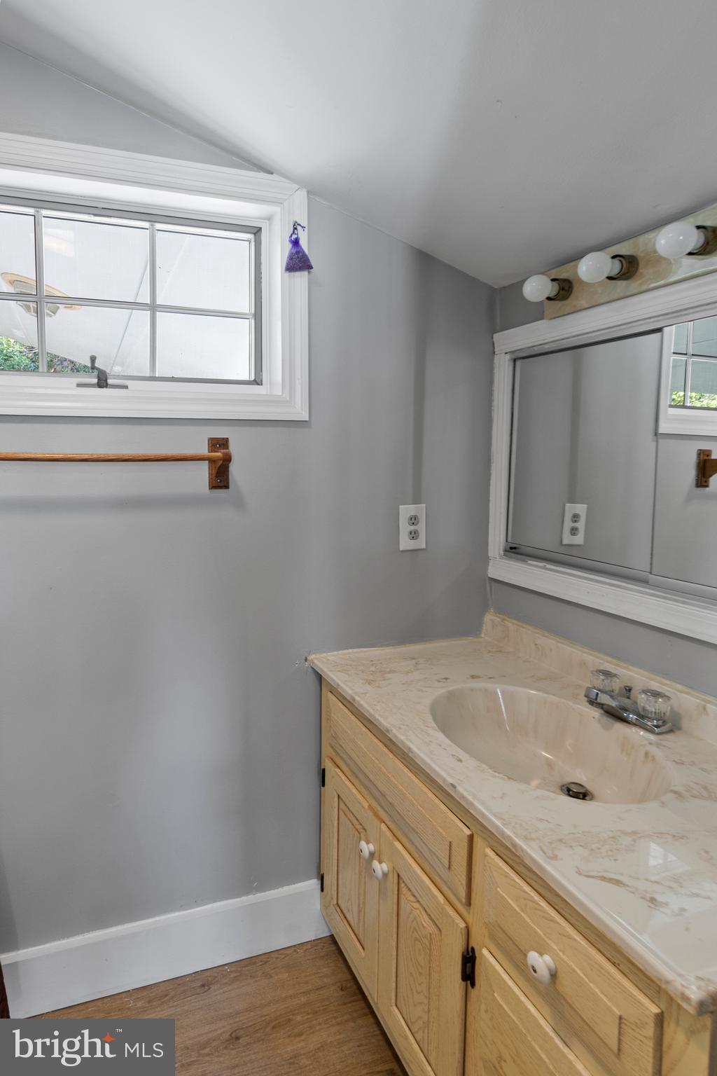 9 Robinson Road Severna Park, MD 21146 - Photo 35 of 51 a bathroom with a sink and a vanity