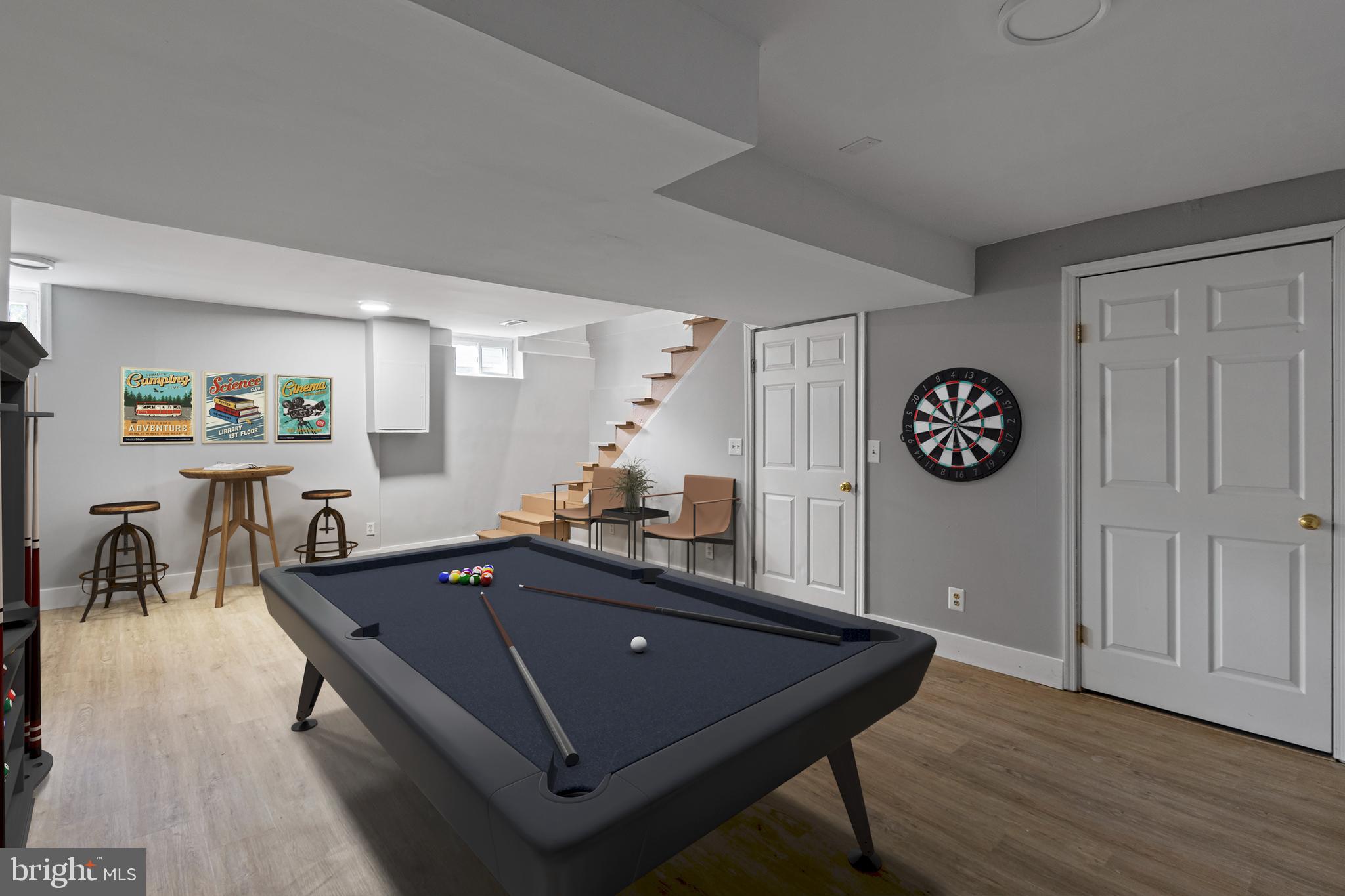 9 Robinson Road Severna Park, MD 21146 - Photo 36 of 51 a room with a table and chairs