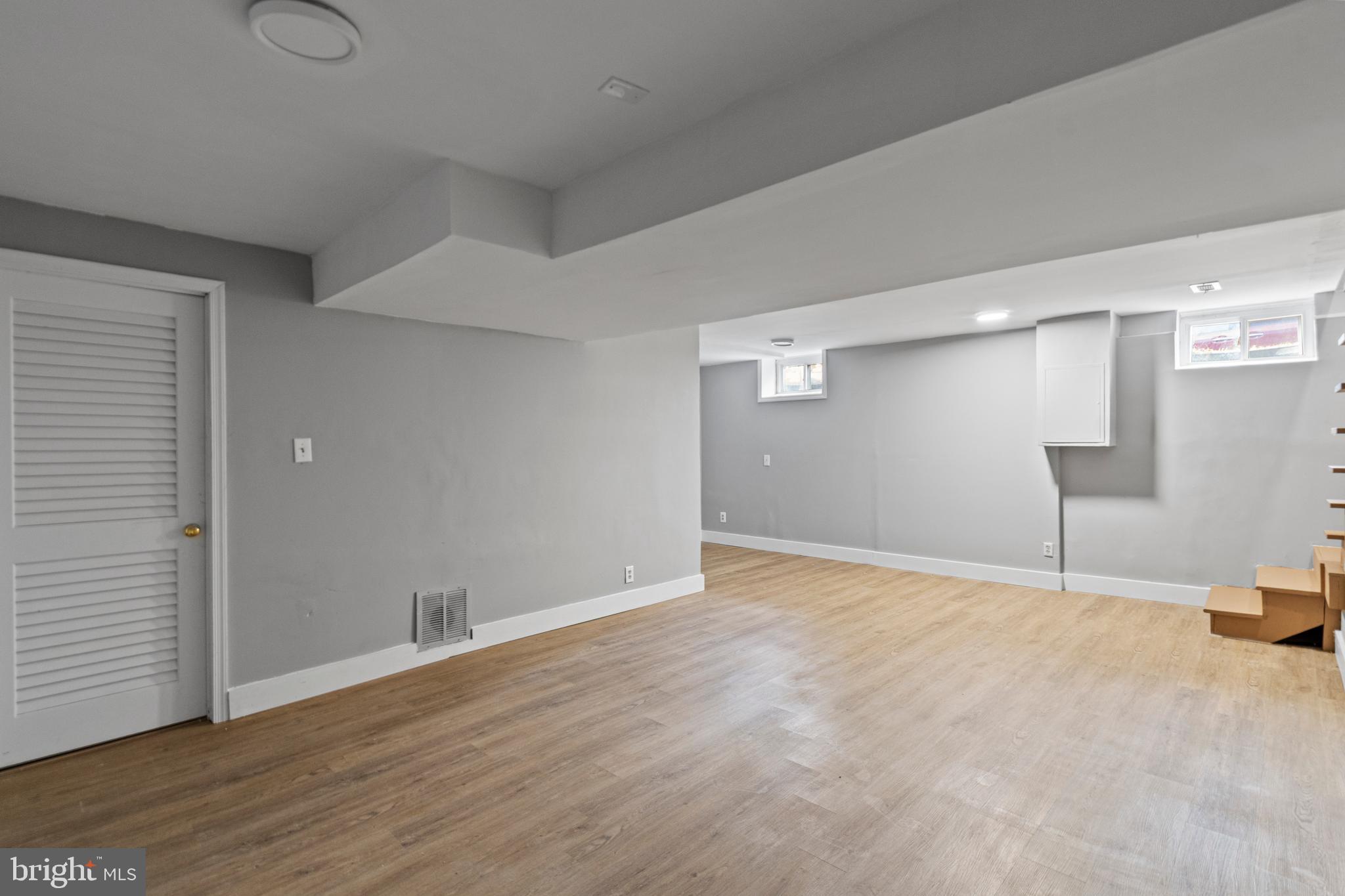 9 Robinson Road Severna Park, MD 21146 - Photo 40 of 51 a view of an empty room with wooden floor and closet
