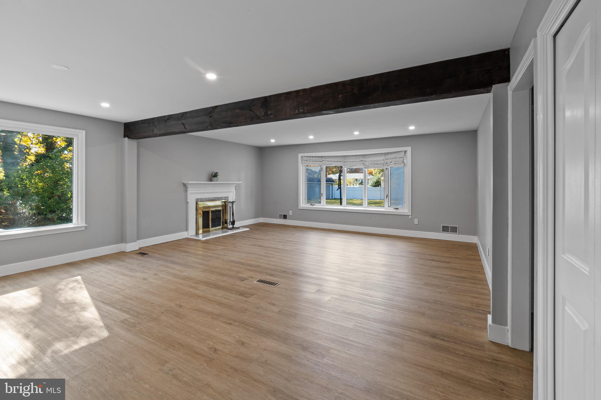 9 Robinson Road Severna Park, MD 21146 - Photo 4 of 51 wooden floor in an empty room with a window