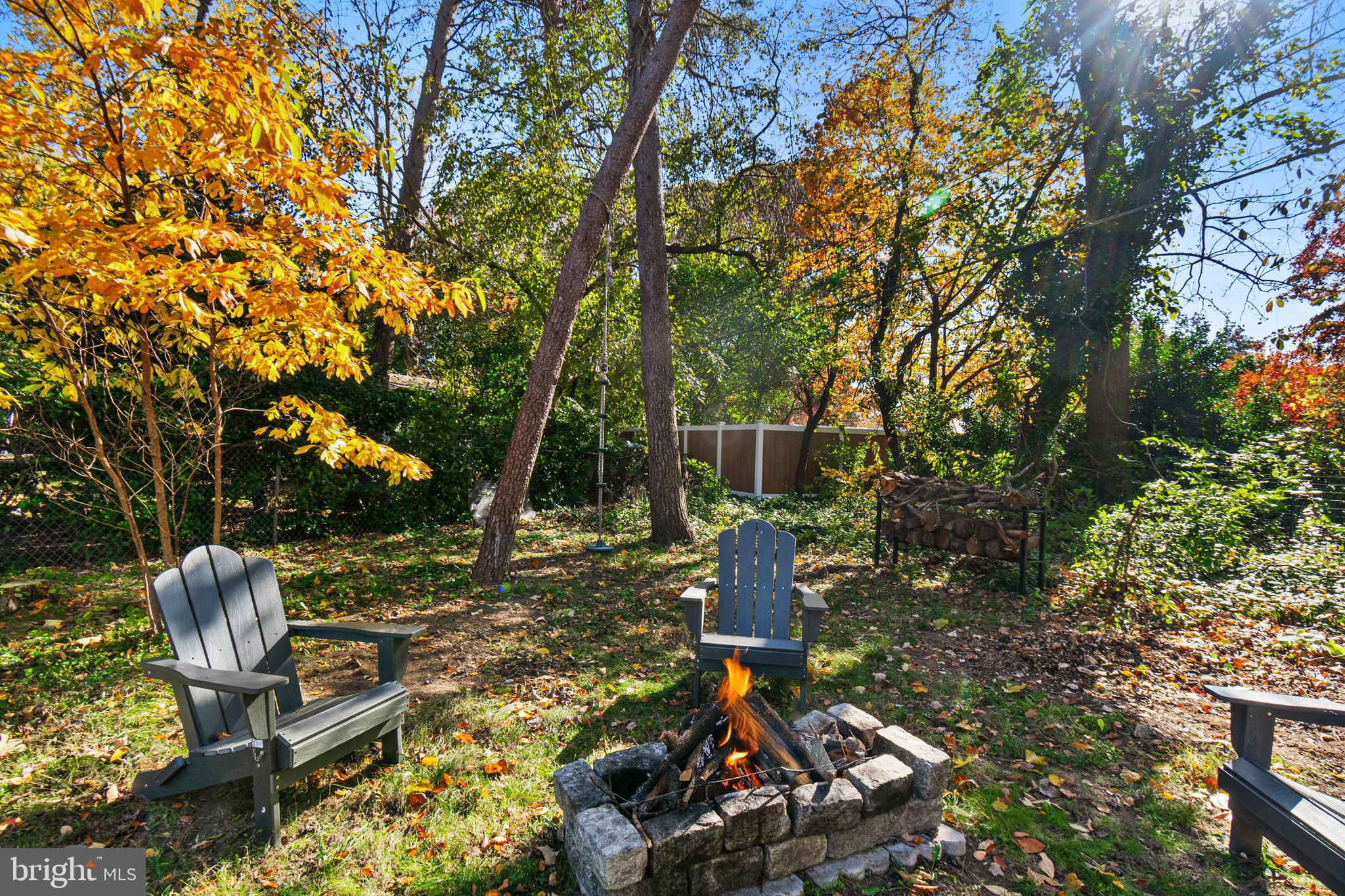 9 Robinson Road Severna Park, MD 21146 - Photo 45 of 51 a backyard of a house with table and chairs