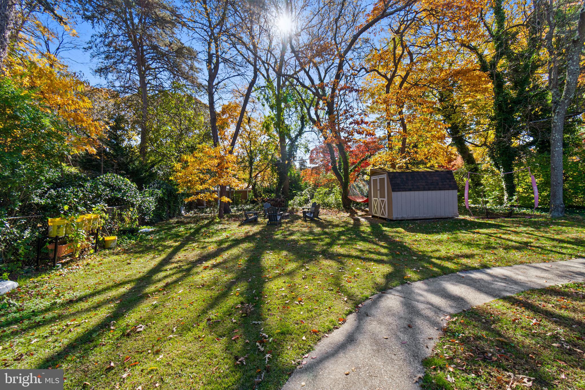 9 Robinson Road Severna Park, MD 21146 - Photo 47 of 51 a sign board with tall trees