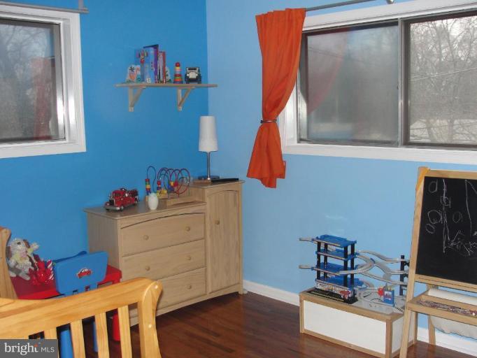 511 Waterford Road Silver Spring, MD 20901 - Photo 15 of 20 a room with furniture and wooden floor