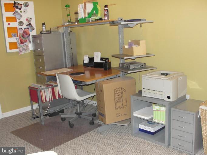 511 Waterford Road Silver Spring, MD 20901 - Photo 16 of 20 a view of a workspace with furniture