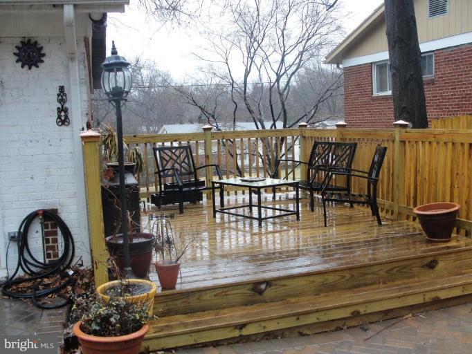 511 Waterford Road Silver Spring, MD 20901 - Photo 17 of 20 a view of a swimming pool with a patio