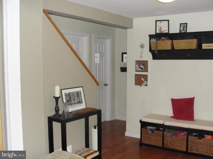 511 Waterford Road Silver Spring, MD 20901 - Photo 19 of 20 a view of a livingroom with furniture and wooden floor