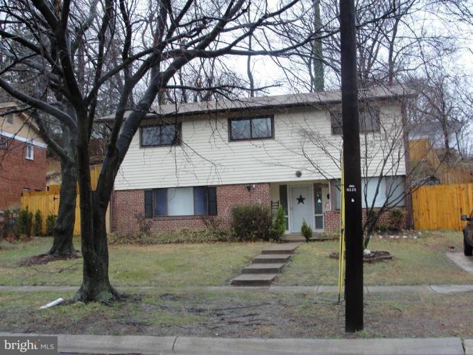 511 Waterford Road Silver Spring, MD 20901 - Photo 3 of 20 a front view of a house with garden