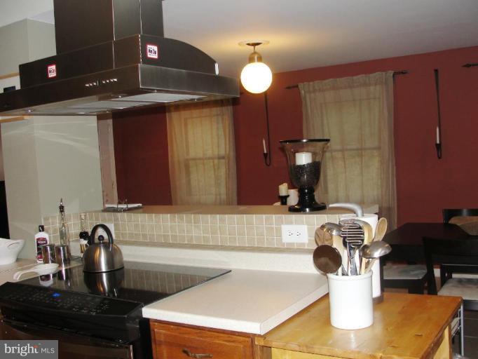 511 Waterford Road Silver Spring, MD 20901 - Photo 6 of 20 a kitchen with a sink and a microwave
