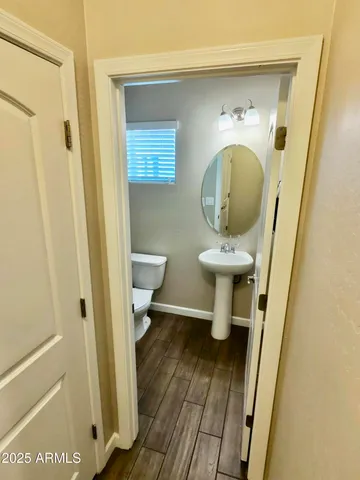 a view of a hallway with washer and dryer