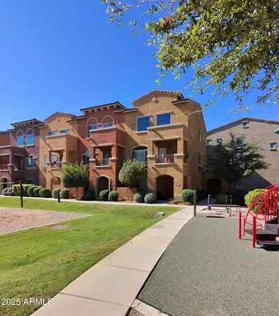 a front view of a building with garden