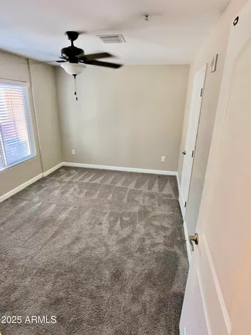a bathroom with a tub and a sink