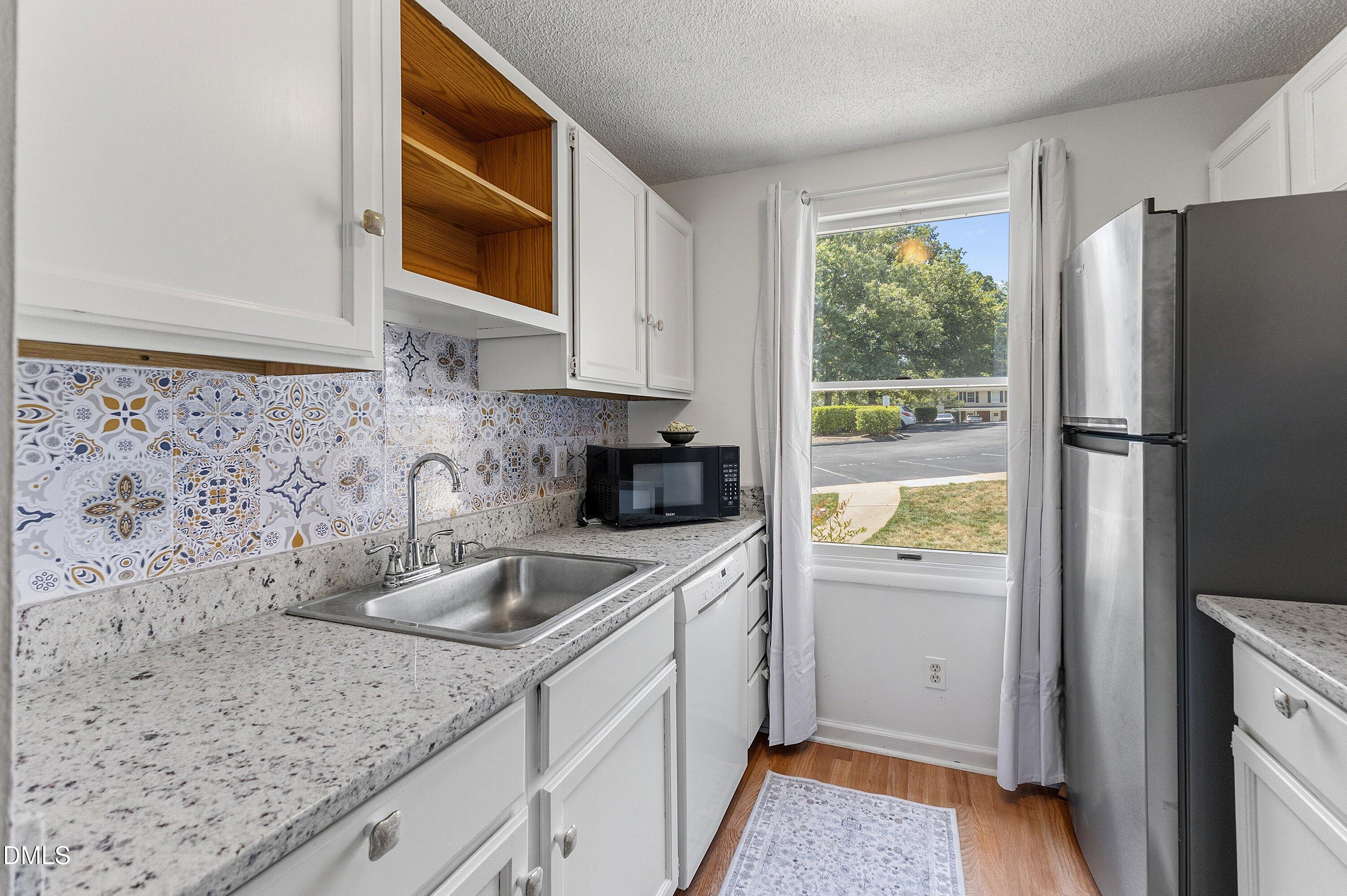 7734 Kingsberry Court Raleigh, NC 27615 - Photo 6 of 31 10-7734 Kingsberry Ct_7465