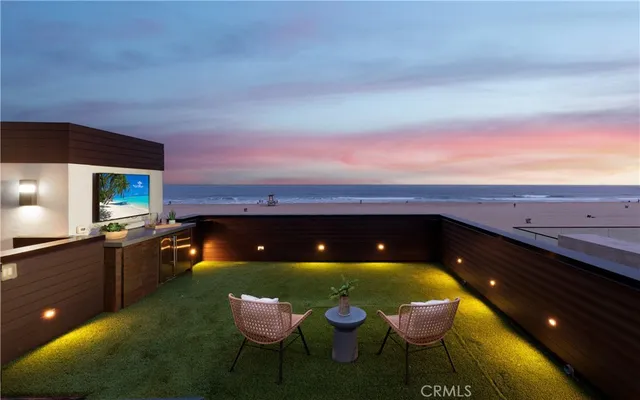 a view of swimming pool outdoor seating