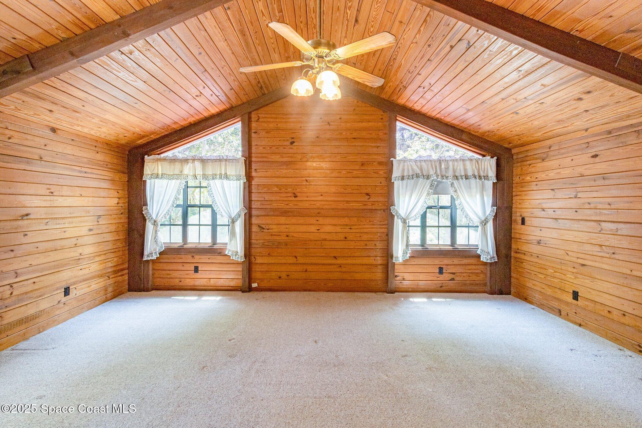 630 Chase Hammock Road Merritt Island, FL 32953 - Photo 14 of 37 a view of an empty room with a window