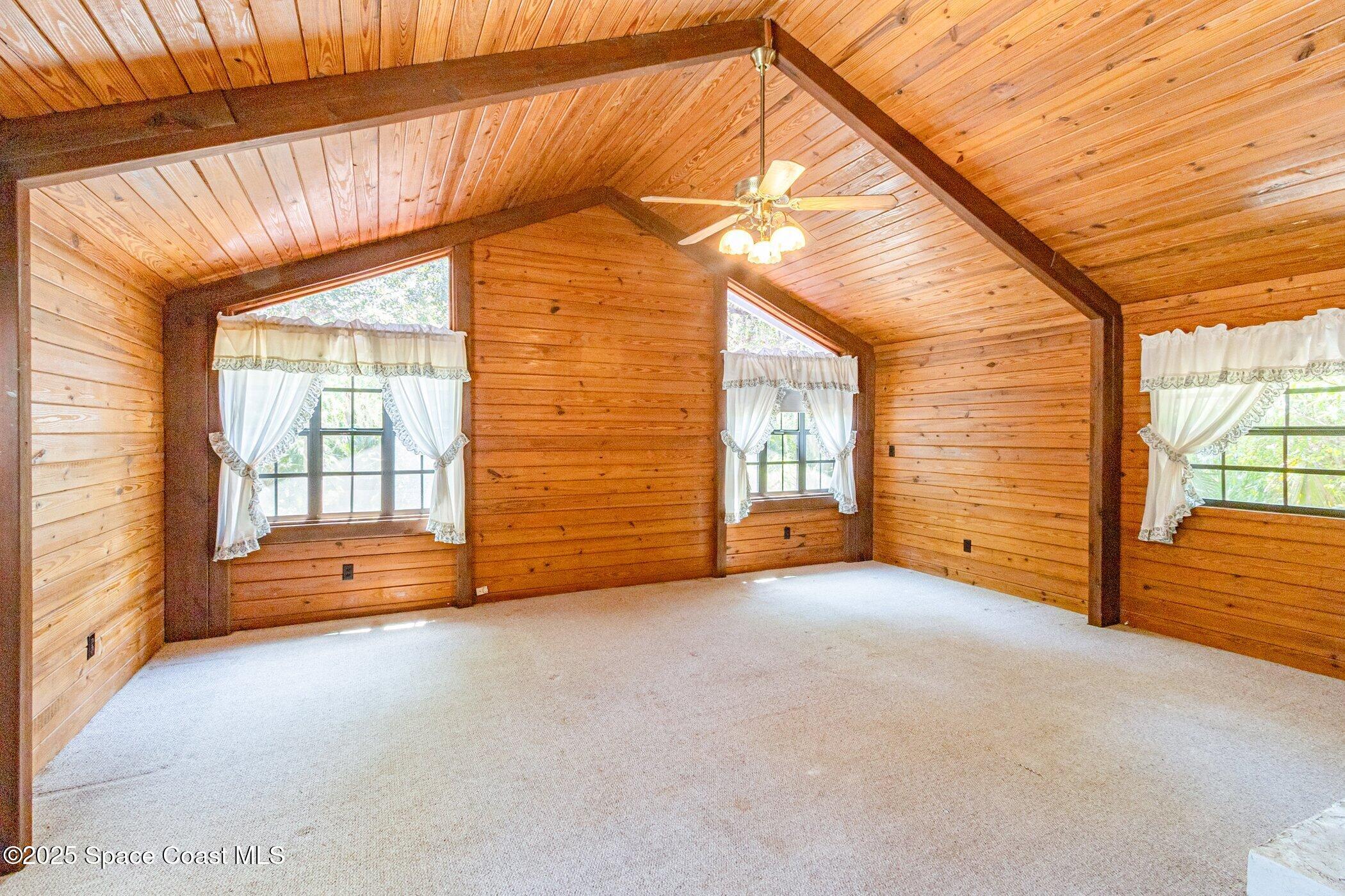 630 Chase Hammock Road Merritt Island, FL 32953 - Photo 16 of 37 a view of an empty room with a window