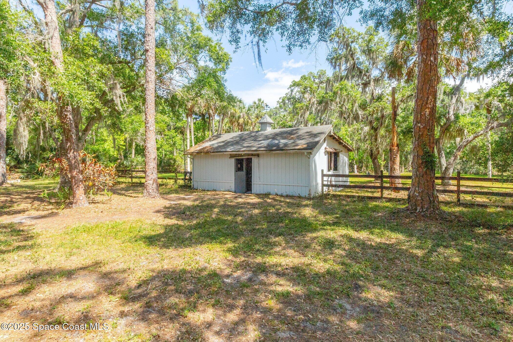 630 Chase Hammock Road Merritt Island, FL 32953 - Photo 29 of 37 a view of outdoor space and yard