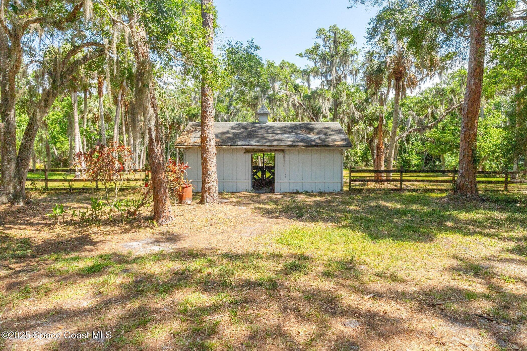 630 Chase Hammock Road Merritt Island, FL 32953 - Photo 30 of 37 a view of outdoor space and yard