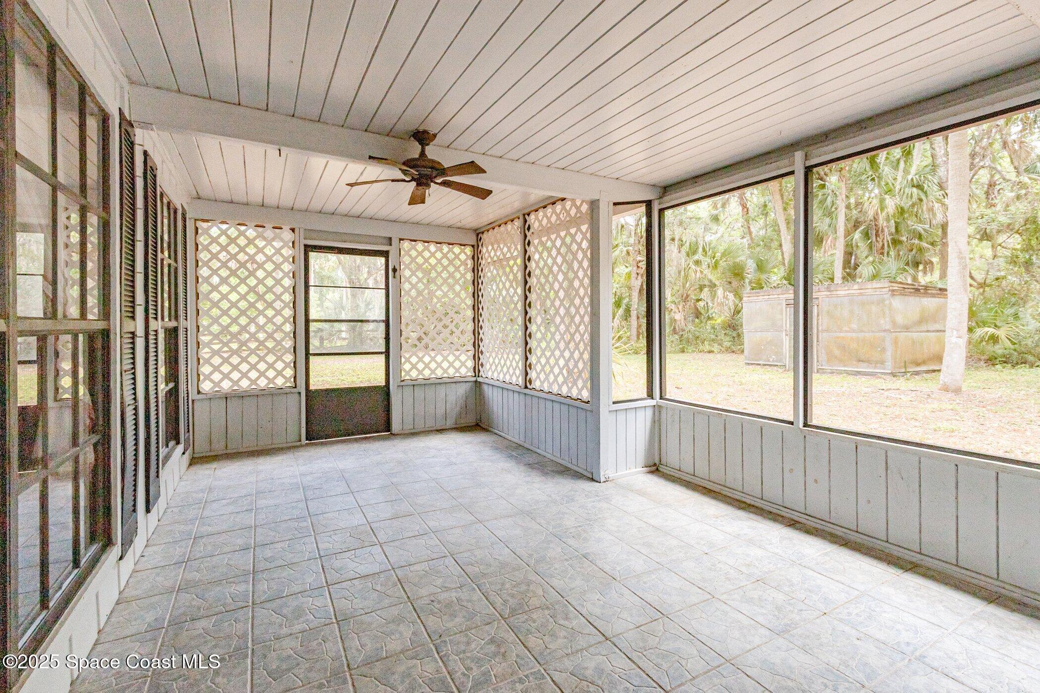 630 Chase Hammock Road Merritt Island, FL 32953 - Photo 31 of 37 a view of an empty room with a window