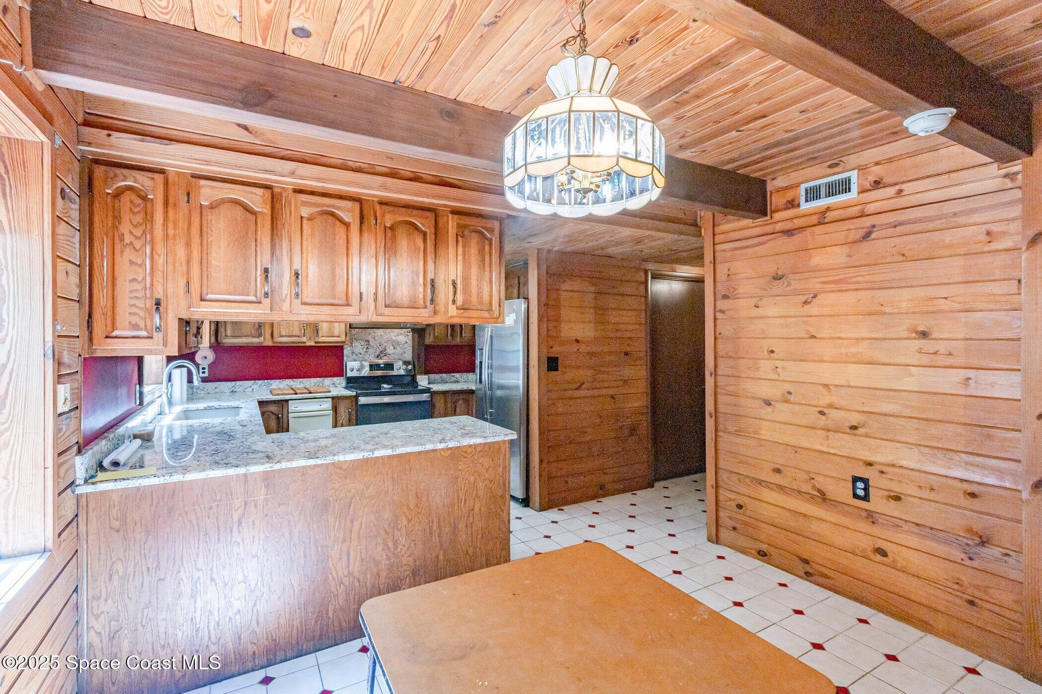 630 Chase Hammock Road Merritt Island, FL 32953 - Photo 8 of 37 view of hall way with furniture