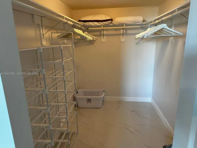 a view of a room with racks on the wall